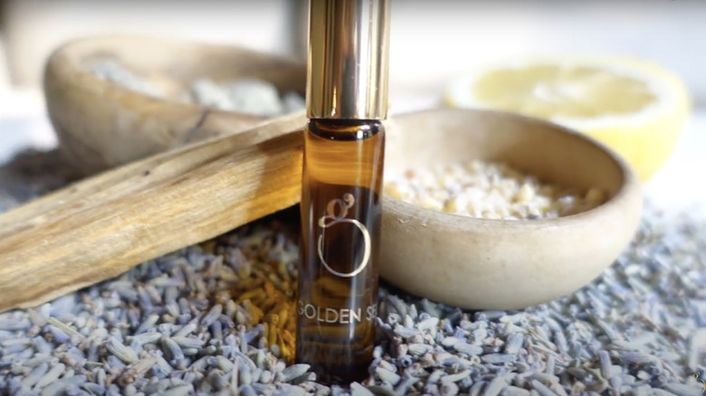 The Golden Secrets oil next to lavender