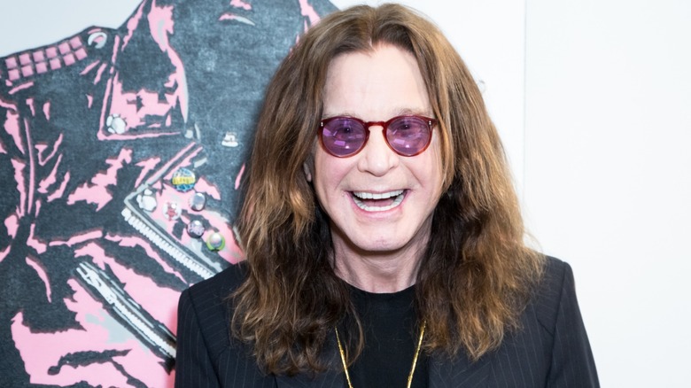 Ozzy Osbourne in shades and smiling at the Billy Morrison - Aude Somnia Solo Exhibition at Elisabeth Weinstock