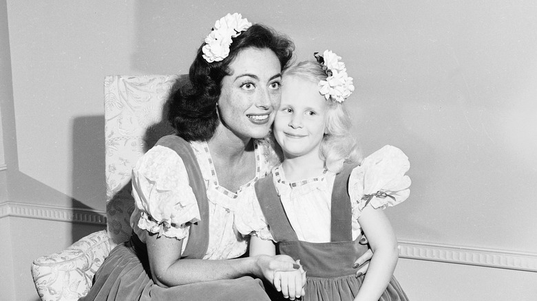 Joan Crawford posing with daughter Christina Crawford