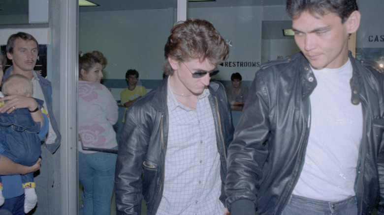 Sean Penn in a leather jacket at prison in the 1980s