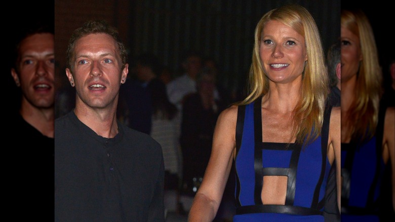 Gwyneth Paltrow wearing a blue dress and Chris Martin in a candid.