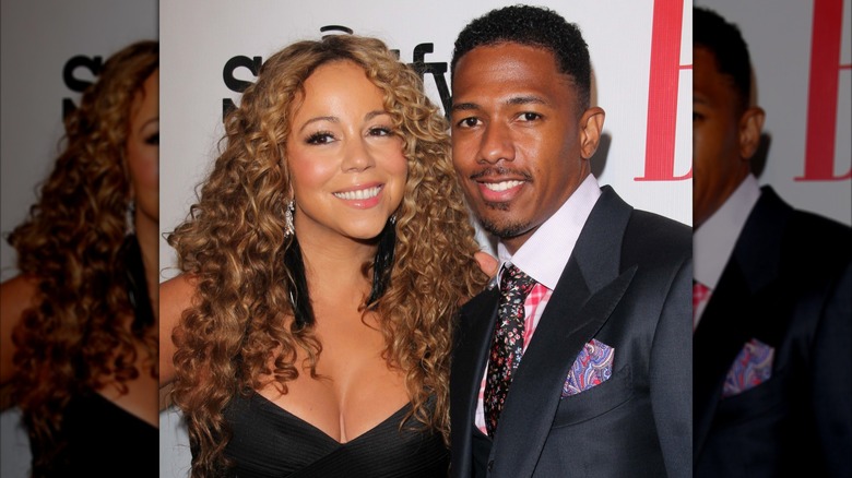 Nick Cannon and Mariah Carey smiling.