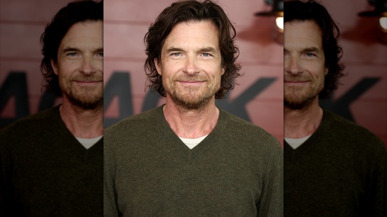 Jason Bateman smiling at an event for Black Rabbit.