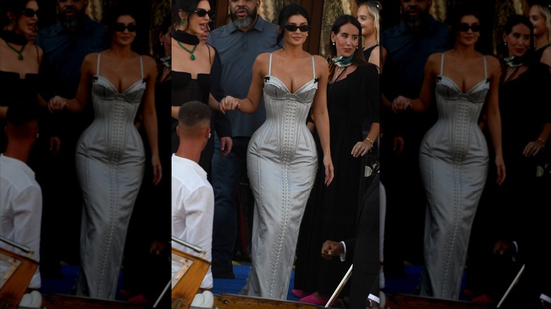 Kylie Jenner walking in sunglasses