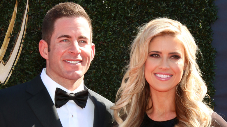 Christina Haack and Tarek El Moussa smiling at event