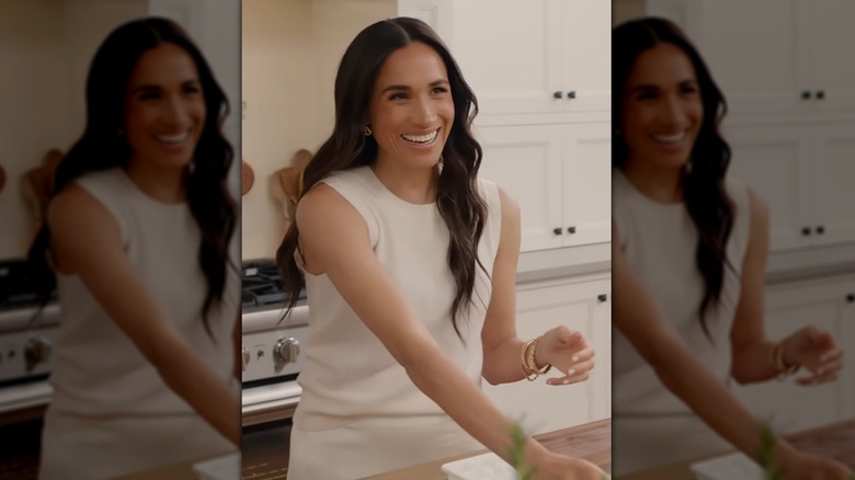 Meghan Markle laughing in her kitchen during her show "With Love, Meghan"