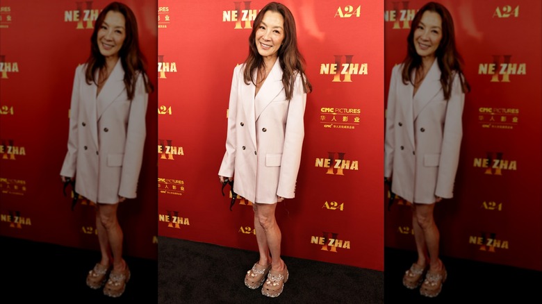 Michelle Yeoh posing