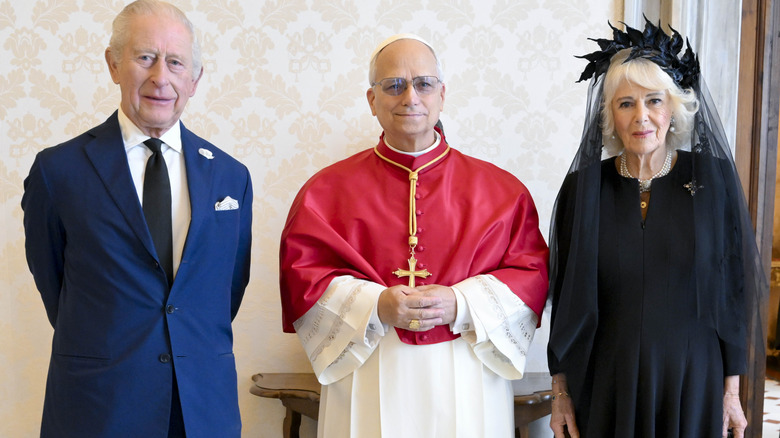 King Charles, Pope Leo, and Queen Camilla at a photo call at the Vatican