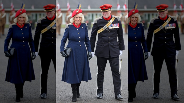 Queen Camilla walking with the Royal Lancers