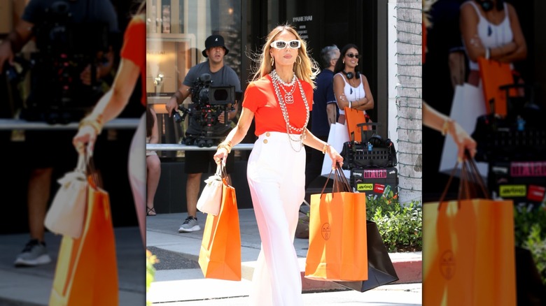 Dorit Kemsley holding shopping bags
