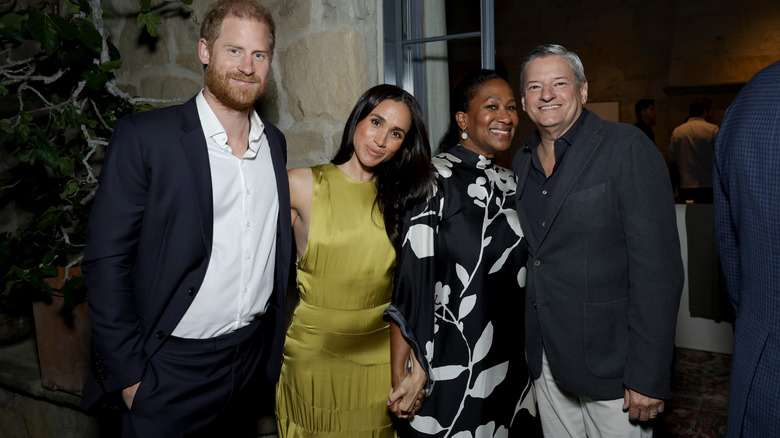 Prince Harry and Meghan Markle with Netflix CEO Ted Sarandos and his wife, Nicole Avante