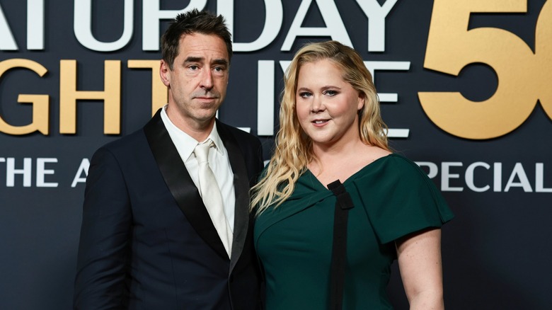 Chris Fischer and Amy Schumer at SNL's 50th Anniversary special in February 2025