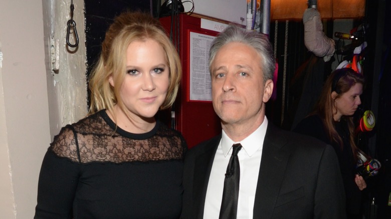 Amy Schumer and Jon Stewart backstage in 2015