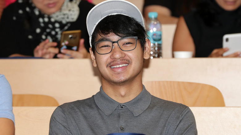 Maddox Jolie-Pitt smiling at the entrance ceremony at Yonsei University in 2019