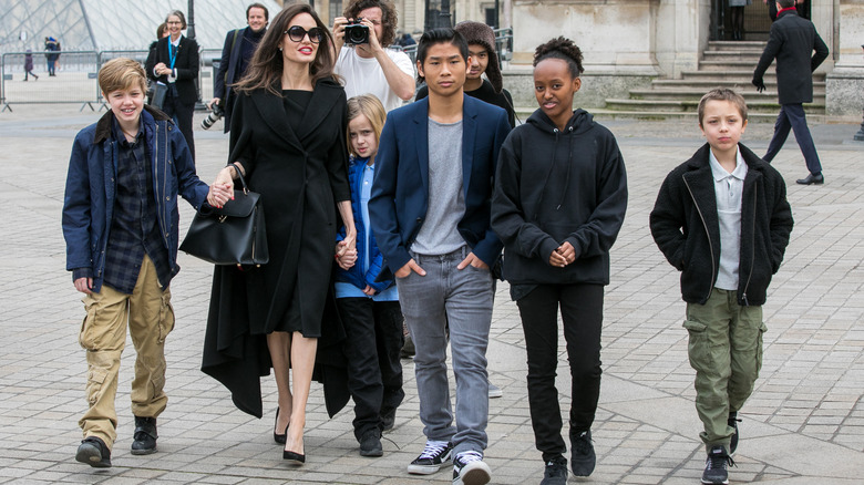 Angelina Jolie, Maddox, Zahara, Shiloh, Pax, Vivienne, and Knox Jolie-Pitt leaving the Louvre museum in 2018