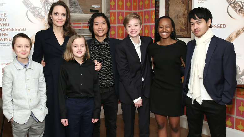 Angelina, Maddox, Zahara, Shiloh, Pax, Vivienne, and Knox Jolie-Pitt smiling at the special screening of "The Boy Who Harnessed the Wind"