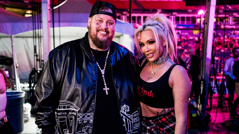 Bunnie Xo and Jelly Roll posing at CMA Fest in 2024