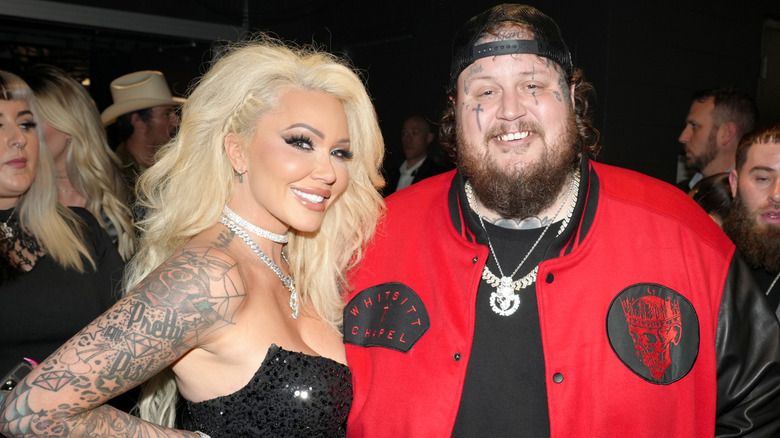 Jelly Roll and Bunnie Xo smiling at the CMT Music Awards in 2023