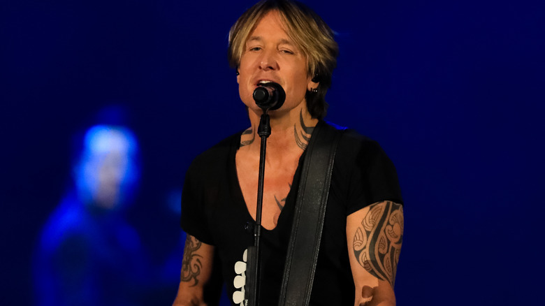 Keith Urban performing at the ATLive concert 2019