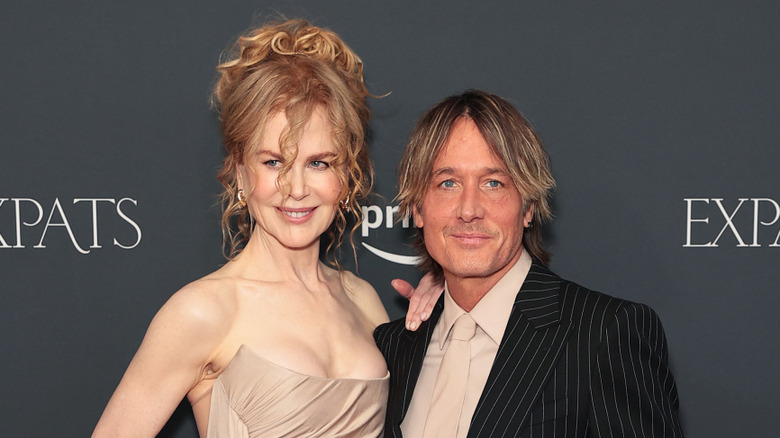 Keith Urban and Nicole Kidman smiling at the screening of "Expats" in 2023