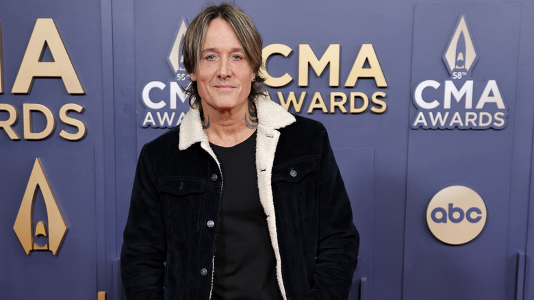 Keith Urban smiling at the Country Music Awards in 2024