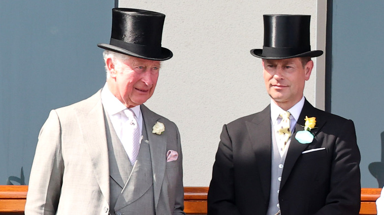 King Charles and Prince Edward wearing top hats at Royal Ascot in 2021.