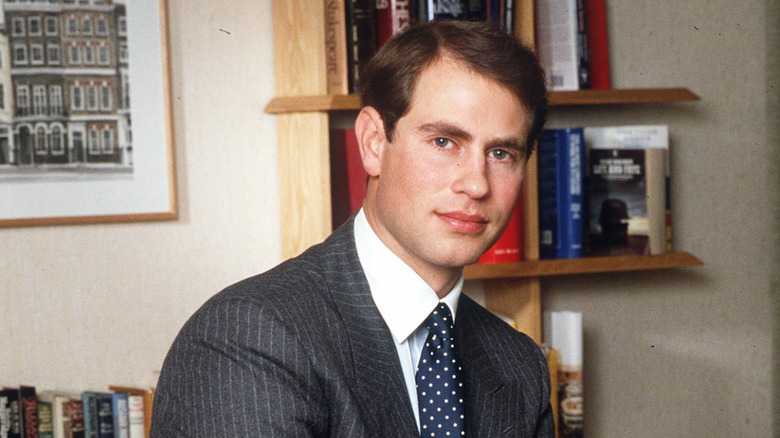 Young Prince Edward posing in his office in 1987