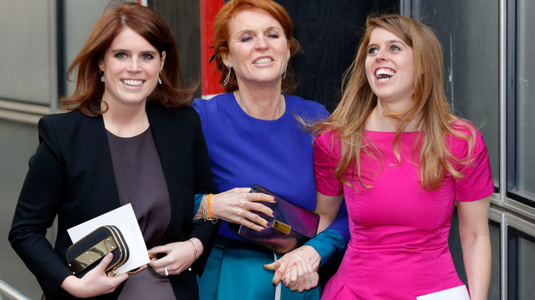 Princess Eugenie, Sarah Ferguson, and Princess Beatrice laughing