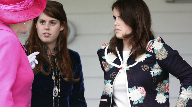 Queen Elizabeth talks to Princess Beatrice and Princess Eugenie