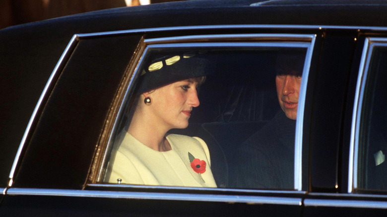 Princess Diana sitting with King Charles III in a car