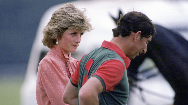 Princess Diana and King Charles III during a polo game
