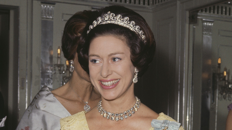 Princess Margaret smiling in tiara and diamond necklace