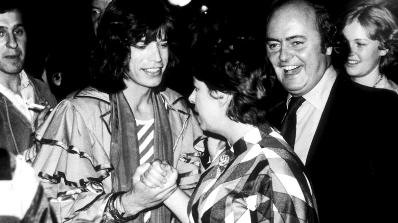 Princess Margaret shaking hands with Mick Jagger