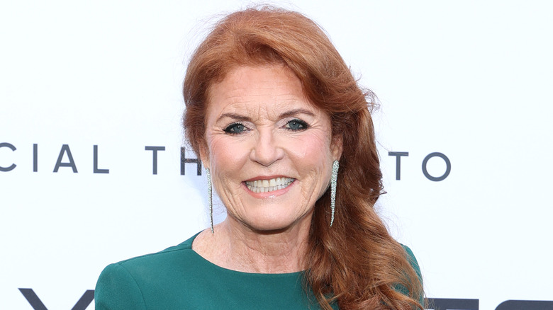 Closeup of Sarah Ferguson smiling on step-and-repeat