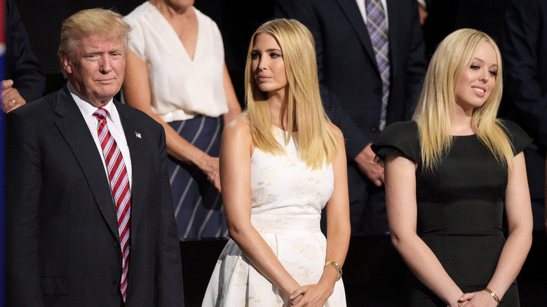 Ivanka Trump looking at Donald Trump as she stands between him and Tiffany Trump at the 2016 Republican National Convention