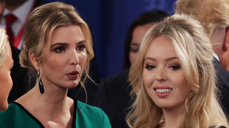 Ivanka Trump speaking beside a smiling Tiffany Trump at the second presidential debate in 2016