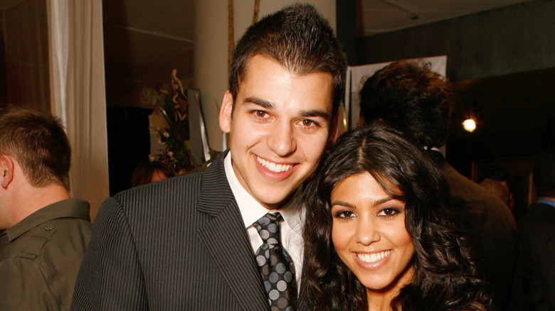 Robert Kardashian and Kourtney Kardashian smile at the "Keeping Up With The Kardashians" premiere party on October 9, 2007 in West Hollywood, California (2007)