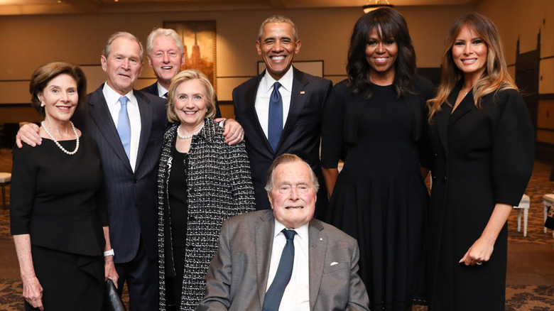 Former presidents and first ladies pose for a photo together