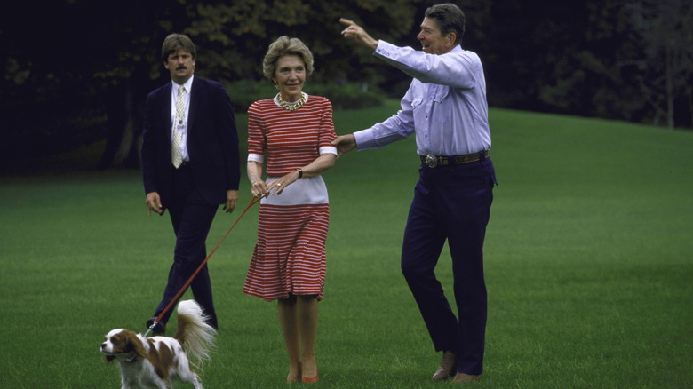 President Ronald W. Reagan and his wife returning to the White House from Camp David