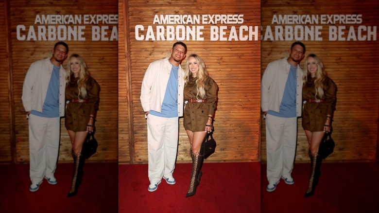 Brittany Mahomes and Patrick Mahomes on the carpet for American Express Carbone Beach
