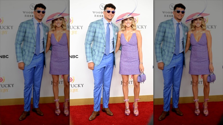 Patrick Mahomes and Brittany Mahomes posing on the red carpet for the Kentucky Derby
