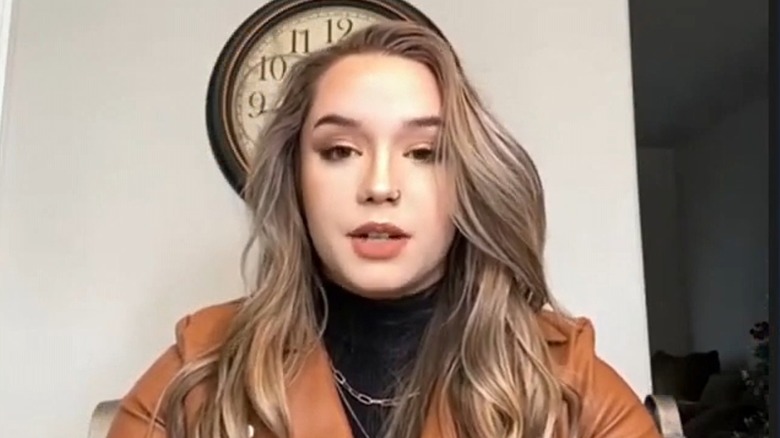 Hannah Archuleta wearing a tan jacket and black turtleneck in a virtual call with Fox 13 News Utah
