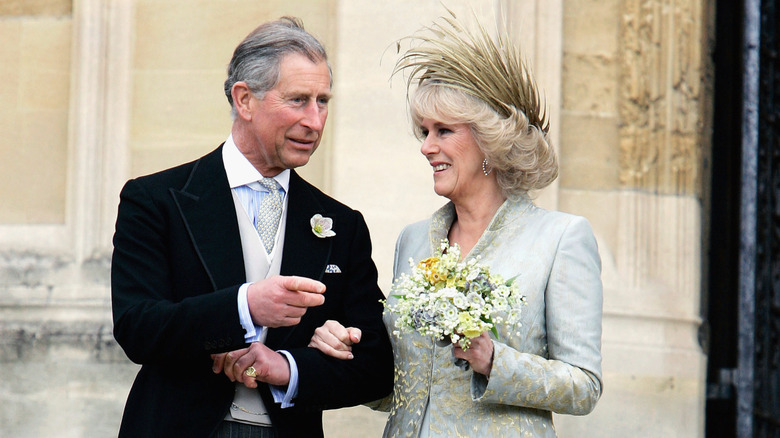 King Charles and Queen Camilla chatting during their wedding