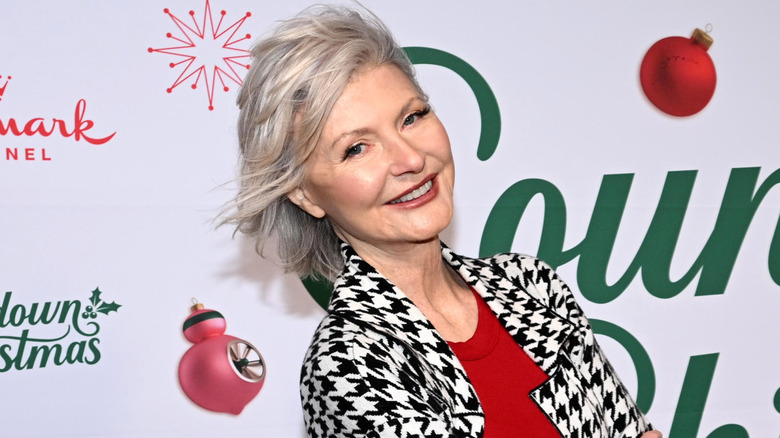 Beth Broderick posing at a Hallmark event