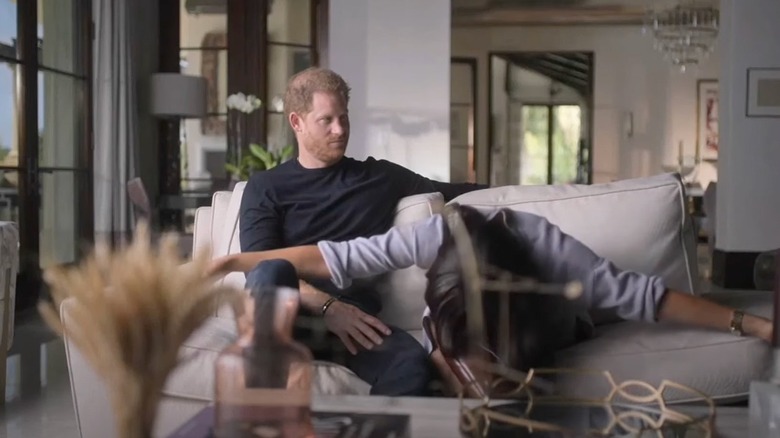 Meghan Markle in her Netflix documentary curtseying in a seated position