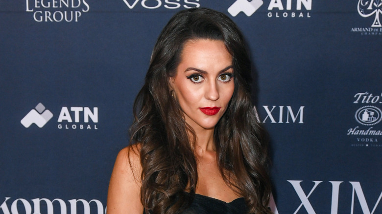 Jordon Hudson wearing a black chiffon outfit at the 2025 MAXIM Saints and Sinners Big Game Party