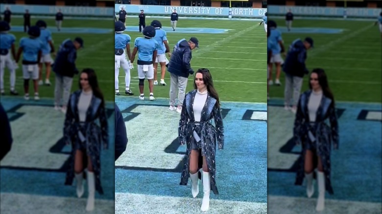 Jordon Hudson smirks as she walks off the UNC football field