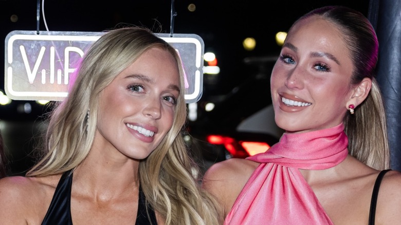 Alex Cooper and Alix Earle on the streets of New York in 2023, smiling