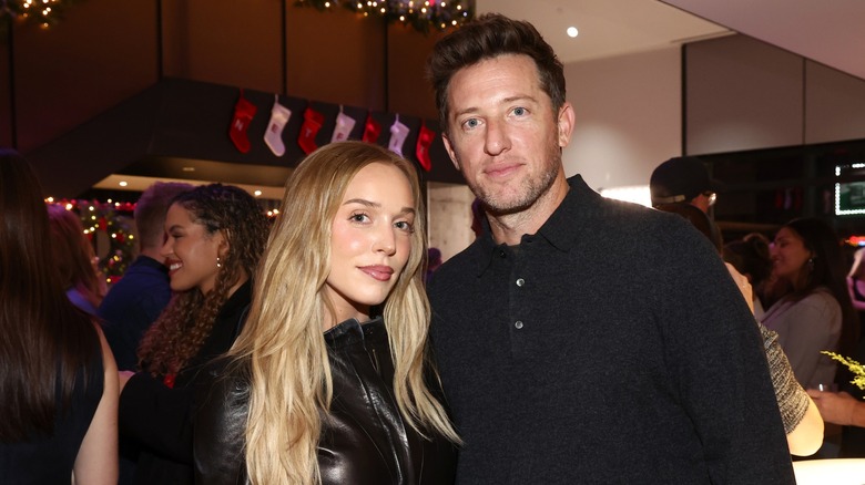 Alex Cooper and Matt Kaplan at a party in 2025