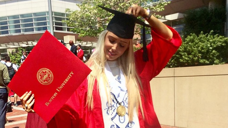 Alex Cooper celebrating her graduation from Boston University in 2017